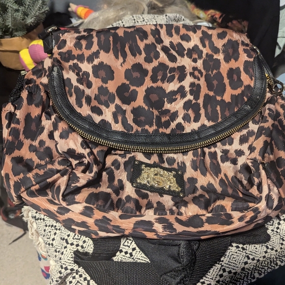 Juicy Couture Handbags - Juicy Couture Leopard Print Adjustable Shoulder Bag with Water Resistant Lining